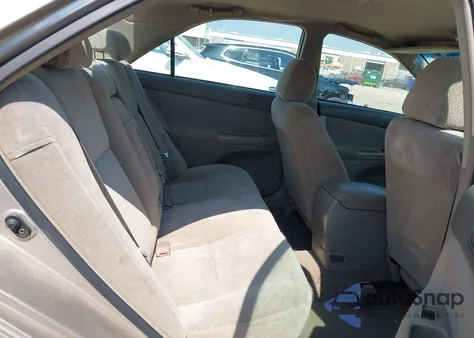 2002 Toyota Camry Le z USA, uszkodzony, nr VIN 4T1BE32K42U512328